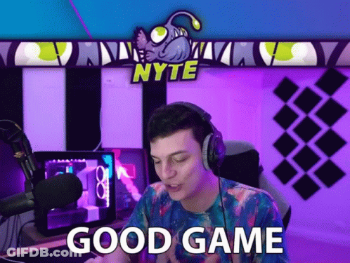 Man With Headphones Says Good Game In Front Of Nyte Banner GIF