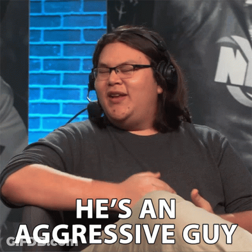 Man With Headphones Says He's An Aggressive Guy GIF