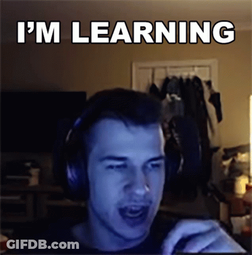 Man With Headphones Says I'm Learning At Computer GIF