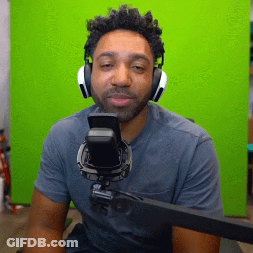 Man With Headphones Sitting At Microphone GIF
