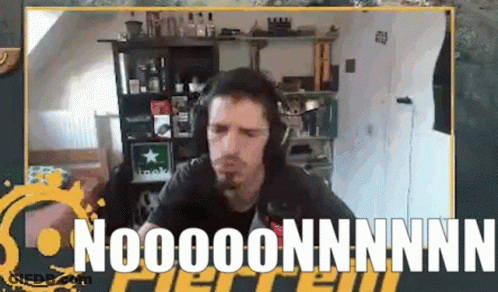 Man With Headphones Sitting In Front Of Nooooonnnnn Sign GIF