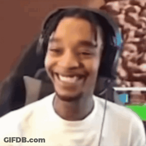 Man With Headphones Smiling At Camera GIF