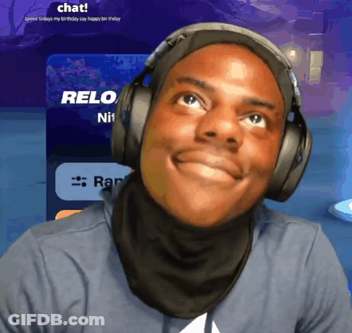 Man With Headphones Smiling At Chat Screen GIF