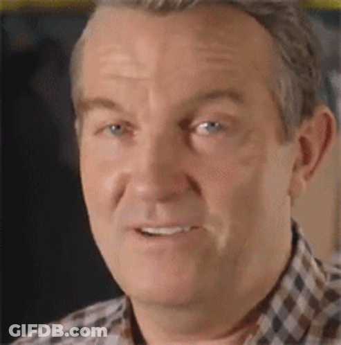 Man With Headphones Smoking Cigarette Says Rip Bozo GIF