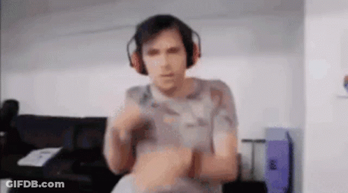 Man With Headphones Standing Arms Crossed GIF