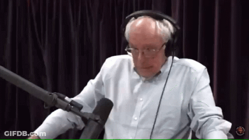 Man With Headphones Talking Into Microphone GIF