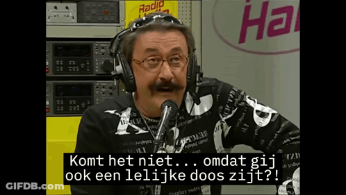 Man With Headphones Talks Into Microphone At Radio Station GIF