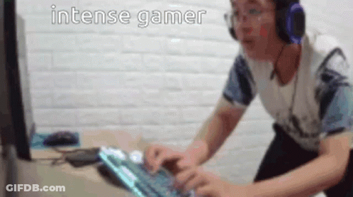 Man With Headphones Typing On Keyboard GIF