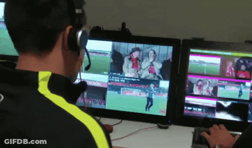 Man With Headphones Watching Soccer Game Tacron GIF