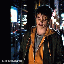 Man With Headphones Wearing Titans Shirt GIF