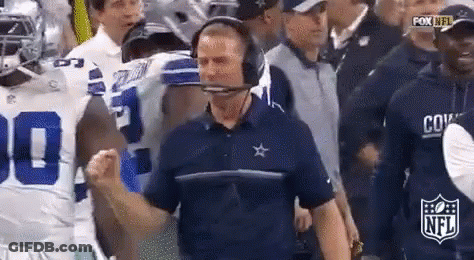Man With Headset And Football Players GIF