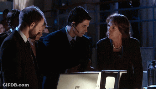 Man With Headset Talking To Group GIF