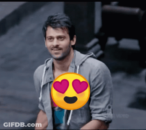 Man With Hearts In Eyes And Smiley Face GIF