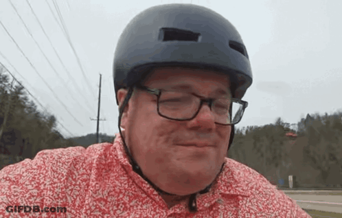 Man With Helmet And Glasses Smiling GIF