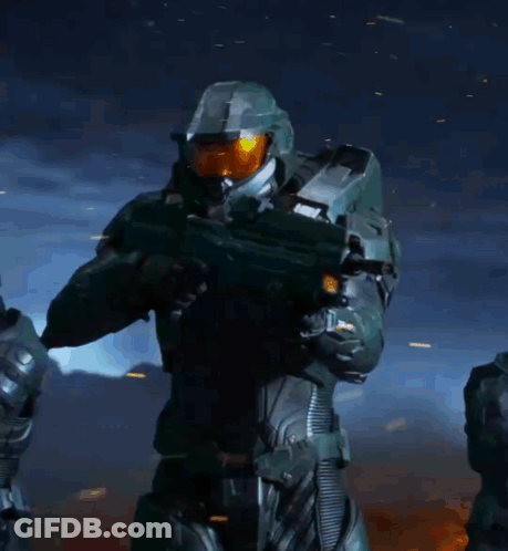 Man With Helmet Holding Gun GIF
