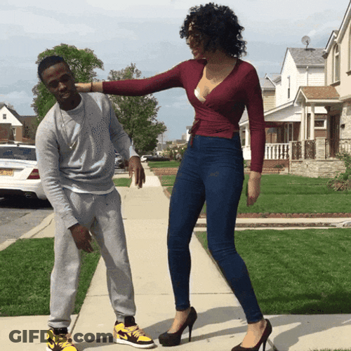 Man With His Lanky Girlfriend GIF