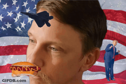 Man With Hot Dog In Mouth And Donald Trump In Front Of Flag GIF