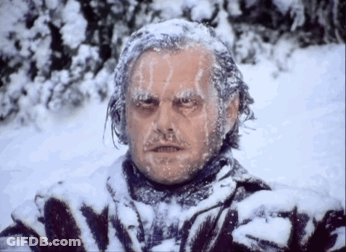 Man With Ice On Face In Snowy Field GIF