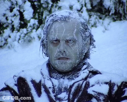 Man With Ice On Face In Snowy Forest GIF