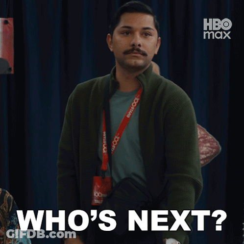 Man With Lanyard Saying Who's Next GIF