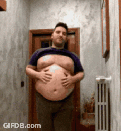 Man With Large Belly Shirtless In Hallway GIF