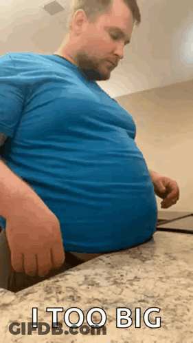 Man With Large Belly Sitting GIF