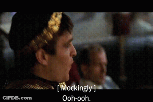 Man With Laurel Wreath Mockingly Saying Ooh Ooh GIF