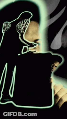 Man With Letter M On Chest GIF