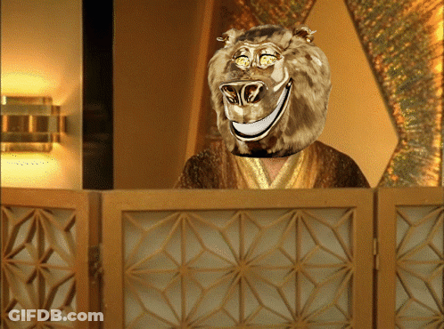 Man With Lion Head Behind Wooden Fence GIF