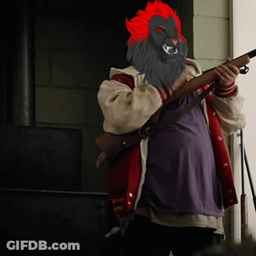 Man With Lion Mask Holding Gun GIF
