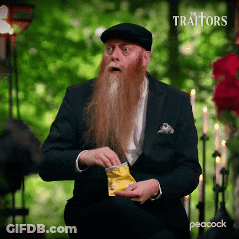 Man With Long Beard Eating Potato Chips GIF