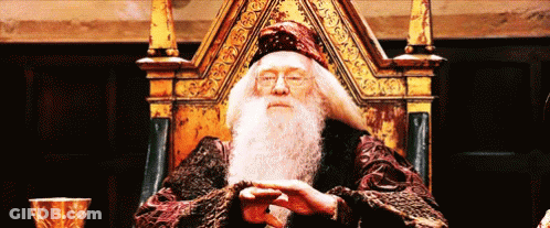 Man With Long Beard Sitting On Throne GIF