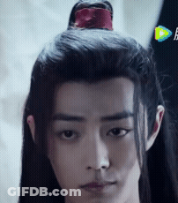 Man With Long Black Hair And Red Flower GIF