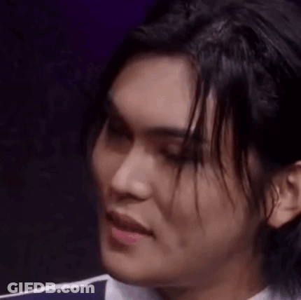 Man With Long Black Hair Making Funny Face GIF