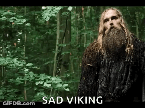 Man With Long Blonde Hair And Beard In Woods GIF