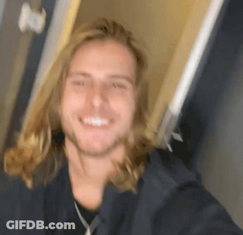 Man With Long Blonde Hair And Beard Smiling GIF