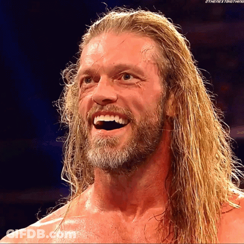 Man With Long Blonde Hair And Beard Smiling GIF