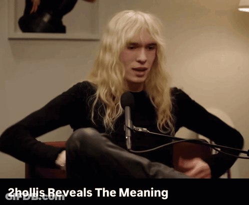 Man With Long Blonde Hair At Microphone 2Hollis Reveals The Meaning Behind Him GIF