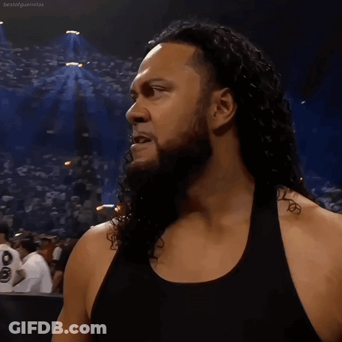 Man With Long Curly Hair And Beard In Tank Top GIF