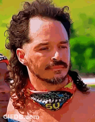 Man With Long Curly Hair And Beard Wearing Survivor Bandana GIF