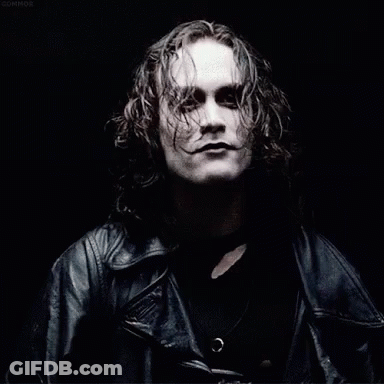 Man With Long Curly Hair In Black Leather Jacket GIF