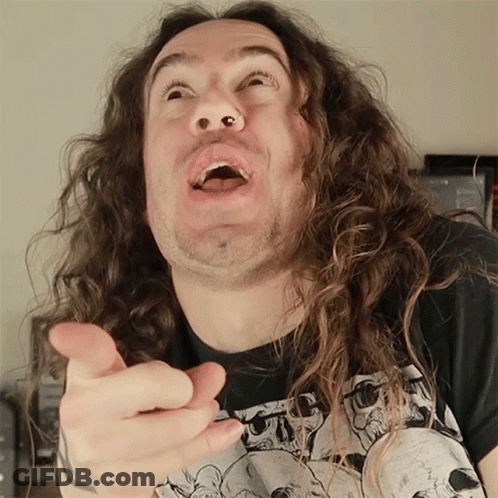 Man With Long Curly Hair Pointing Finger GIF