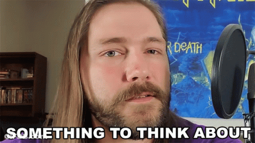 Man With Long Hair And Beard At Microphone GIF