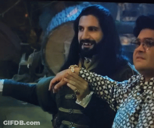 Man With Long Hair And Beard Beside Another Man GIF