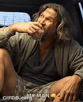 Man With Long Hair And Beard Drinking Bottle GIF