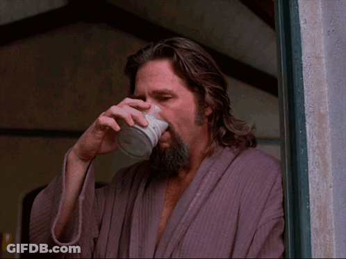 Man With Long Hair And Beard Drinking Milk GIF