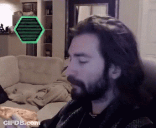 Man With Long Hair And Beard Eating Pizza GIF