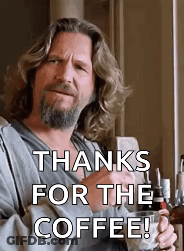 Man With Long Hair And Beard Holding Coffee Says Thanks GIF