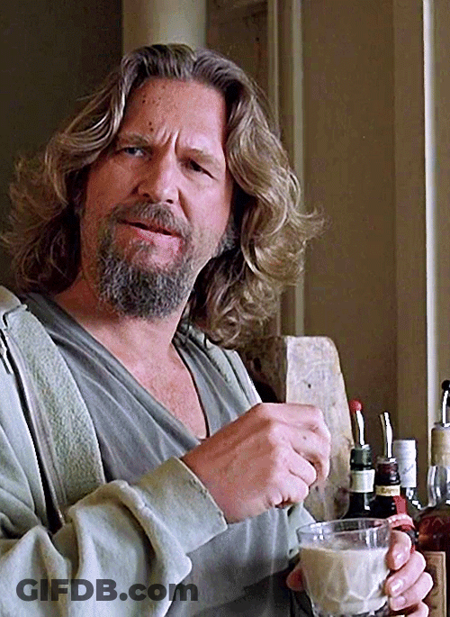 Man With Long Hair And Beard Holding Milk GIF