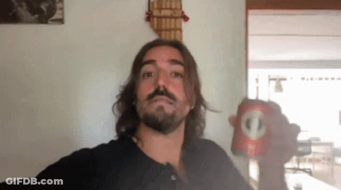 Man With Long Hair And Beard Holding Soda Can With Circle GIF